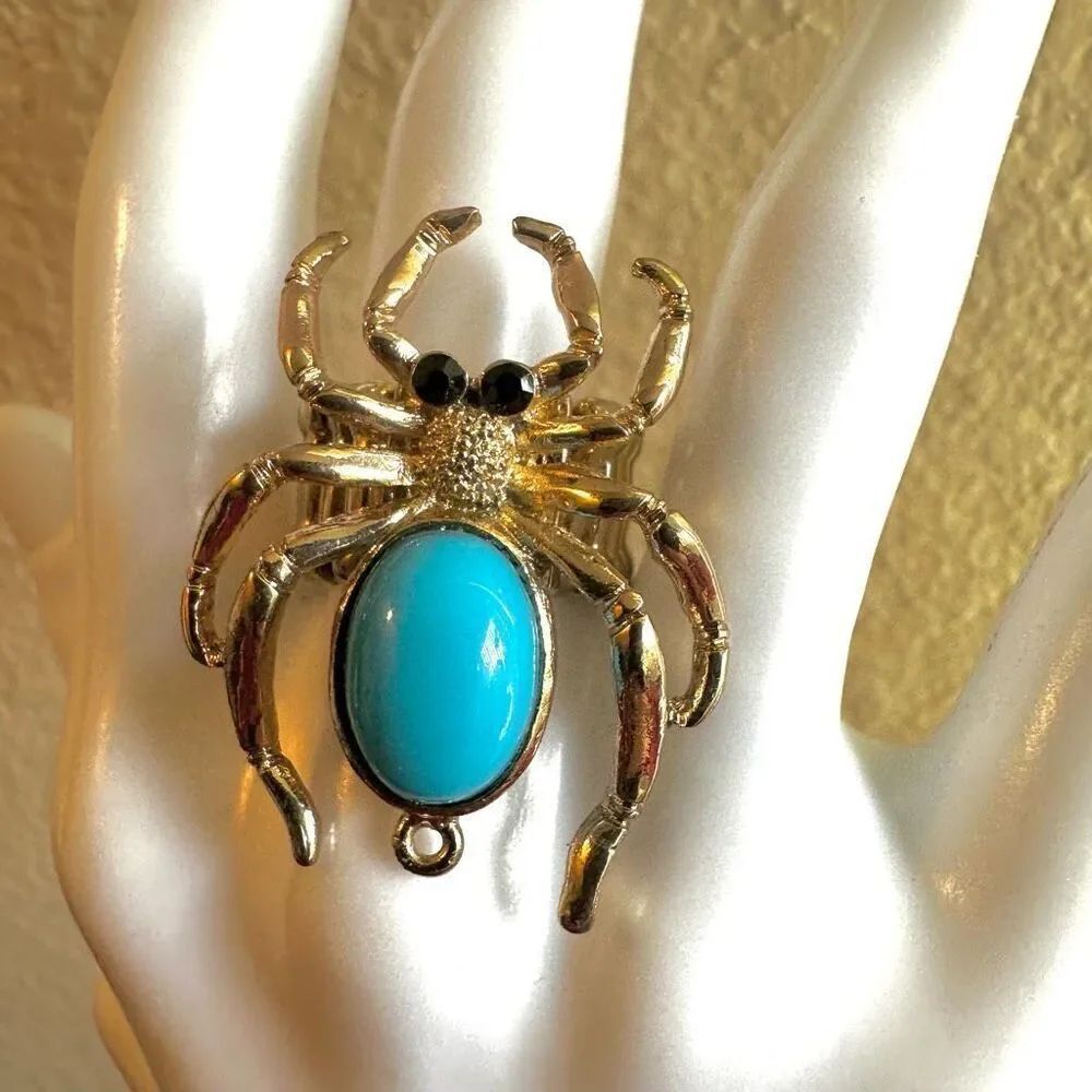 Gold tone and blue adjustable spider ring